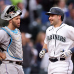 SEATTLE, WASHINGTON - JUNE 13: Cal Raleigh #29 of the Seattle Mariners hits a three-run home run against the Miami Marlins during the second inning at T-Mobile Park on June 13, 2023 in Seattle, Washington. (Photo by Steph Chambers/Getty Images)