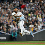 SEATTLE, WASHINGTON - JUNE 18: J.P. Crawford #3 of the Seattle Mariners throws to first base during the eighth inning against the Chicago White Sox at T-Mobile Park on June 18, 2023 in Seattle, Washington. (Photo by Alika Jenner/Getty Images)
