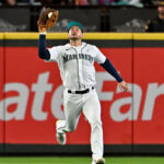 SEATTLE, WASHINGTON - JUNE 18: Jarred Kelenic #10 of the Seattle Mariners catches a ball for an out during the eighth inning against the Chicago White Sox at T-Mobile Park on June 18, 2023 in Seattle, Washington. (Photo by Alika Jenner/Getty Images)