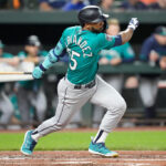 BALTIMORE, MARYLAND - JUNE 23: Teoscar Hernandez #35 of the Seattle Mariners singles in the third inning against the Baltimore Orioles at Oriole Park at Camden Yards on June 23, 2023 in Baltimore, Maryland. (Photo by Mitchell Layton/Getty Images)