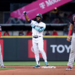 SEATTLE, WASHINGTON - JUNE 26: Teoscar Hernandez #35 of the Seattle Mariners celebrates his double against the Washington Nationals during the fifth inning at T-Mobile Park on June 26, 2023 in Seattle, Washington. (Photo by Steph Chambers/Getty Images)