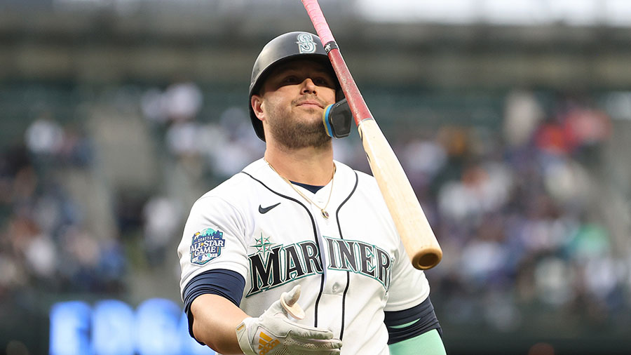 A Seattle Mariners fan wearing a Cal Raleigh jersey with Raleigh's  nickname, Big Dumper, enters T-Mobile Park before an opening day baseball  game between the Seattle Mariners and the Cleveland Guardians Thursday