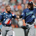 SAN FRANCISCO, CALIFORNIA - JULY 4: Tom Murphy (L) #2 congratulates teammate Logan Gilbert #36 of the Seattle Mariners after his complete game shutout against the San Francisco Giants at Oracle Park on July 04, 2023 in San Francisco, California. (Photo by Brandon Sloter/Getty Images)