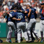SAN FRANCISCO, CALIFORNIA - JULY 4: Seattle Mariners players surround Logan Gilbert #36 to celebrate his complete game shut out against the San Francisco Giants at Oracle Park on July 04, 2023 in San Francisco, California. (Photo by Brandon Sloter/Getty Images)