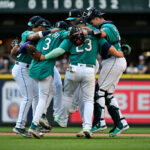 SEATTLE, WASHINGTON - JULY 01: Ty France #23, J.P. Crawford #3, Cal Raleigh #29, Eugenio Suarez #28, Paul Sewald #37, and Jose Caballero #76 of the Seattle Mariners dance after the game against the Tampa Bay Rays at T-Mobile Park on July 01, 2023 in Seattle, Washington. The Seattle Mariners won 8-3. (Photo by Alika Jenner/Getty Images)