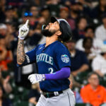 HOUSTON, TEXAS - JULY 06: J.P. Crawford #3 of the Seattle Mariners celebrates after hitting a solo home run in the third inning against the Houston Astros at Minute Maid Park on July 06, 2023 in Houston, Texas. (Photo by Logan Riely/Getty Images)