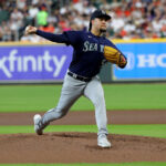HOUSTON, TEXAS - JULY 07: Luis Castillo #58 of the Seattle Mariners pitches ion the first inning against the Houston Astros at Minute Maid Park on July 07, 2023 in Houston, Texas. (Photo by Bob Levey/Getty Images)