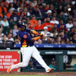 HOUSTON, TEXAS - JULY 09: Martin Maldonado #15 of the Houston Astros flies out to the left field in the third inning against the Seattle Mariners at Minute Maid Park on July 09, 2023 in Houston, Texas. (Photo by Bob Levey/Getty Images)