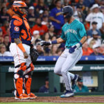 HOUSTON, TEXAS - JULY 09: Julio Rodriguez #44 of the Seattle Mariners scores in the fourth inning against the Houston Astros at Minute Maid Park on July 09, 2023 in Houston, Texas. (Photo by Bob Levey/Getty Images)