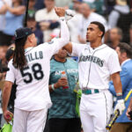 SEATTLE, WASHINGTON - JULY 10: Julio Rodríguez #44 celebrates with Luis Castillo #58 of the Seattle Mariners during the T-Mobile Home Run Derby at T-Mobile Park on July 10, 2023 in Seattle, Washington. (Photo by Tim Nwachukwu/Getty Images)
