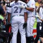 SEATTLE, WASHINGTON - JULY 10: Julio Rodríguez #44 of the Seattle Mariners congratulates Vladimir Guerrero Jr. #27 of the Toronto Blue Jays during the T-Mobile Home Run Derby at T-Mobile Park on July 10, 2023 in Seattle, Washington. (Photo by Tim Nwachukwu/Getty Images)