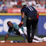 SEATTLE, WASHINGTON - JULY 11: Randy Arozarena #56 of the Tampa Bay Rays reacts after being tagged out by Orlando Arcia #11 of the Atlanta Braves during the 93rd MLB All-Star Game presented by Mastercard at T-Mobile Park on July 11, 2023 in Seattle, Washington. (Photo by Steph Chambers/Getty Images)