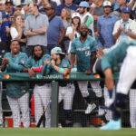SEATTLE, WASHINGTON - JULY 11: American League players react after Julio Rodriguez #44 of the Seattle Mariners earns a walk in the ninth inning during the 93rd MLB All-Star Game presented by Mastercard at T-Mobile Park on July 11, 2023 in Seattle, Washington. (Photo by Steph Chambers/Getty Images)