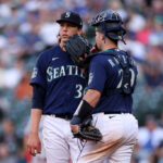 SEATTLE, WASHINGTON - JULY 17: Logan Gilbert #36 and Cal Raleigh #29 of the Seattle Mariners talk during the third inning against the Minnesota Twins at T-Mobile Park on July 17, 2023 in Seattle, Washington. (Photo by Steph Chambers/Getty Images)