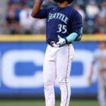 SEATTLE, WASHINGTON - JULY 17: Teoscar Hernandez #35 of the Seattle Mariners reacts after his double during the fifth inning against the Minnesota Twins at T-Mobile Park on July 17, 2023 in Seattle, Washington. (Photo by Steph Chambers/Getty Images)