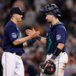 SEATTLE, WASHINGTON - JULY 17: Paul Sewald #37 and Cal Raleigh #29 of the Seattle Mariners celebrate their 7-6 win against the Minnesota Twins at T-Mobile Park on July 17, 2023 in Seattle, Washington. (Photo by Steph Chambers/Getty Images)