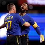 SEATTLE, WASHINGTON - JULY 21: Paul Sewald #37 celebrates a walk-off single by Teoscar Hernandez #35 of the Seattle Mariners during the ninth inning against the Toronto Blue Jays at T-Mobile Park on July 21, 2023 in Seattle, Washington. (Photo by Steph Chambers/Getty Images)