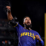 SEATTLE, WASHINGTON - JULY 21: Teoscar Hernandez #35 of the Seattle Mariners celebrates his walk-off single against the Toronto Blue Jays during the ninth inning at T-Mobile Park on July 21, 2023 in Seattle, Washington. (Photo by Steph Chambers/Getty Images)
