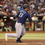 PHOENIX, ARIZONA - JULY 28: Ty France #23 of the Seattle Mariners hits a single against the Arizona Diamondbacks during the fourth inning of the MLB game at Chase Field on July 28, 2023 in Phoenix, Arizona. (Photo by Christian Petersen/Getty Images)
