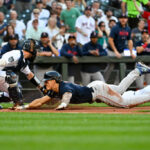 SEATTLE, WASHINGTON - JULY 31: Jarren Duran #16 of the Boston Red Sox scores on a stolen base and two errors during the first inning against the Seattle Mariners at T-Mobile Park on July 31, 2023 in Seattle, Washington. (Photo by Alika Jenner/Getty Images)