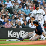 SEATTLE, WASHINGTON - JULY 31: Jarren Duran #16 of the Boston Red Sox scores on a stolen base and two errors during the first inning against the Seattle Mariners at T-Mobile Park on July 31, 2023 in Seattle, Washington. (Photo by Alika Jenner/Getty Images)