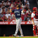 ANAHEIM, CALIFORNIA - AUGUST 4: Julio Rodriguez #44 of the Seattle Mariners celebrates his two-run home run against Reid Detmers #48 (not in the picture) of the Los Angeles Angels during the fourth inning at Angel Stadium of Anaheim on August 4, 2023 in Anaheim, California. (Photo by Kevork Djansezian/Getty Images)