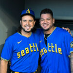 SEATTLE, WASHINGTON - AUGUST 11: Eugenio Suarez (L) #28 of the Seattle Mariners poses with former Mariner Félix Hernández before the game against the Baltimore Orioles at T-Mobile Park on August 11, 2023 in Seattle, Washington. (Photo by Alika Jenner/Getty Images)