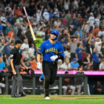 SEATTLE, WASHINGTON - AUGUST 11: Ty France #23 of the Seattle Mariners tosses his bat after hitting a solo home run during the fifth inning against the Baltimore Orioles at T-Mobile Park on August 11, 2023 in Seattle, Washington. (Photo by Alika Jenner/Getty Images)