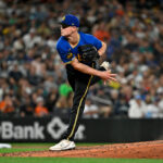 SEATTLE, WASHINGTON - AUGUST 11: Ryder Ryan #77 of the Seattle Mariners pitches during the eighth inning against the Baltimore Orioles at T-Mobile Park on August 11, 2023 in Seattle, Washington. This is Ryan's MLB debut. (Photo by Alika Jenner/Getty Images)
