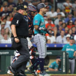 HOUSTON, TEXAS - AUGUST 19: Jose Caballero #76 of the Seattle Mariners has words for Framber Valdez #59 of the Houston Astros after being hit by a pitch in the fifth inning at Minute Maid Park on August 19, 2023 in Houston, Texas. (Photo by Bob Levey/Getty Images)