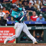 HOUSTON, TEXAS - AUGUST 20: Brian O'Keefe #64 of the Seattle Mariners doubles in two runs in the third inning against the Houston Astros at Minute Maid Park on August 20, 2023 in Houston, Texas. (Photo by Bob Levey/Getty Images)