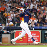 HOUSTON, TEXAS - AUGUST 20: Yordan Alvarez #44 of the Houston Astros singles in two runs in the third inning against the Seattle Mariners at Minute Maid Park on August 20, 2023 in Houston, Texas. (Photo by Bob Levey/Getty Images)