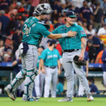 HOUSTON, TEXAS - AUGUST 20: Pitcher Gabe Speier #55 of the Seattle Mariners and Cal Raleigh #29 celebrate a win over the Houston Astros at Minute Maid Park on August 20, 2023 in Houston, Texas. (Photo by Bob Levey/Getty Images)