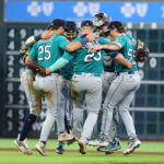 HOUSTON, TEXAS - AUGUST 20: The Seattle Mariners celebrate a 7-6 win over the Houston Astros at Minute Maid Park on August 20, 2023 in Houston, Texas. (Photo by Bob Levey/Getty Images)