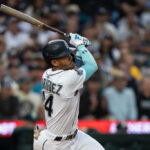 SEATTLE, WA - AUGUST 28: Julio Rodriguez #44 of the Seattle Mariners hit a one-run double off starting pitcher Kyle Muller #39 of the Oakland Athletics during the third inning of a game at T-Mobile Park on August 28, 2023 in Seattle, Washington. (Photo by Stephen Brashear/Getty Images)