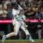 SEATTLE, WA - AUGUST 28: Julio Rodriguez #44 of the Seattle Mariners hits a two-run home run off starting pitcher Kyle Muller #39 of the Oakland Athletics during the fourth inning of a game at T-Mobile Park on August 28, 2023 in Seattle, Washington. (Photo by Stephen Brashear/Getty Images)