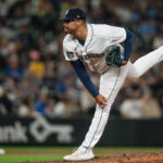 SEATTLE, WA - AUGUST 28:Relief pitcher Isaiah Campbell #49 of the Seattle Mariners delivers a pitch during the eighth inning of a game against the Oakland Athletics at T-Mobile Park on August 28, 2023 in Seattle, Washington. (Photo by Stephen Brashear/Getty Images)