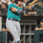 CHICAGO, ILLINOIS - AUGUST 21: Cal Raleigh #29 of the Seattle Mariners watches his solo home run during the fifth inning against the Chicago White Sox at Guaranteed Rate Field on August 21, 2023 in Chicago, Illinois. (Photo by Michael Reaves/Getty Images)