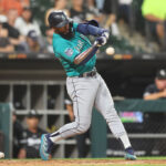 CHICAGO, ILLINOIS - AUGUST 21: Teoscar Hernandez #35 of the Seattle Mariners hits a two-run single against the Chicago White Sox during the sixth inning at Guaranteed Rate Field on August 21, 2023 in Chicago, Illinois. (Photo by Michael Reaves/Getty Images)