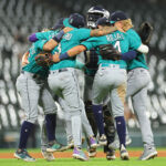 CHICAGO, ILLINOIS - AUGUST 21: The Seattle Mariners celebrate after defeating the Chicago White Sox 14-2 at Guaranteed Rate Field on August 21, 2023 in Chicago, Illinois. (Photo by Michael Reaves/Getty Images)
