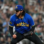 SEATTLE, WASHINGTON - AUGUST 25: Andres Munoz #75 of the Seattle Mariners reacts after striking out the last batter to end the game against the Kansas City Royals at T-Mobile Park on August 25, 2023 in Seattle, Washington. The Seattle Mariners won 7-5. (Photo by Alika Jenner/Getty Images)
