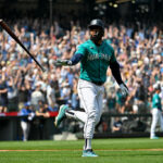SEATTLE, WASHINGTON - AUGUST 26: Teoscar Hernandez #35 of the Seattle Mariners tosses his bat after hitting a grand slam home run during the third inning against the Kansas City Royals at T-Mobile Park on August 26, 2023 in Seattle, Washington. (Photo by Alika Jenner/Getty Images)