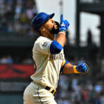 SEATTLE, WASHINGTON - AUGUST 27: Teoscar Hernandez #35 of the Seattle Mariners gestures after hitting a solo home run during the first inning against the Kansas City Royals at T-Mobile Park on August 27, 2023 in Seattle, Washington. (Photo by Alika Jenner/Getty Images)