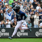 SEATTLE, WASHINGTON - AUGUST 30: Teoscar Hernandez #35 of the Seattle Mariners gestures while running the bases after hitting a three-run home run during the third inning against the Oakland Athletics at T-Mobile Park on August 30, 2023 in Seattle, Washington. (Photo by Alika Jenner/Getty Images)