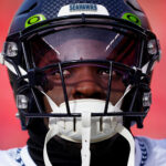 KANSAS CITY, MISSOURI - DECEMBER 24: Boye Mafe #53 of the Seattle Seahawks looks on during pregame Kansas City Chiefs at Arrowhead Stadium on December 24, 2022 in Kansas City, Missouri. (Photo by Jason Hanna/Getty Images)