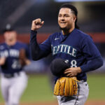 NEW YORK, NEW YORK - SEPTEMBER 02: Luis Castillo #58 of the Seattle Mariners gestures to fans at the end of the first inning against the New York Mets at Citi Field on September 02, 2023 in New York City. (Photo by Dustin Satloff/Getty Images)