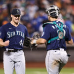 NEW YORK, NEW YORK - SEPTEMBER 02: Justin Topa (L) #48 of the Seattle Mariners and Cal Raleigh #29 of the Seattle Mariners react after defeating the New York Mets  at Citi Field on September 02, 2023 in New York City. (Photo by Dustin Satloff/Getty Images)