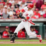 CINCINNATI, OHIO - SEPTEMBER 06: TJ Friedl #29 of the Cincinnati Reds hits a triple in the first inning against the Seattle Mariners at Great American Ball Park on September 06, 2023 in Cincinnati, Ohio. (Photo by Dylan Buell/Getty Images)