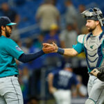 ST PETERSBURG, FLORIDA - SEPTEMBER 07: Andres Munoz #75 and Cal Raleigh #29 of the Seattle Mariners shake hands in the ninth inning during a game against the Tampa Bay Rays at Tropicana Field on September 07, 2023 in St Petersburg, Florida. (Photo by Mike Ehrmann/Getty Images)