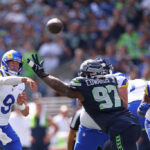 SEATTLE, WASHINGTON - SEPTEMBER 10:  Matthew Stafford #9 of the Los Angeles Rams attempts a pass against the Seattle Seahawks during the first half at Lumen Field on September 10, 2023 in Seattle, Washington. (Photo by Steph Chambers/Getty Images)